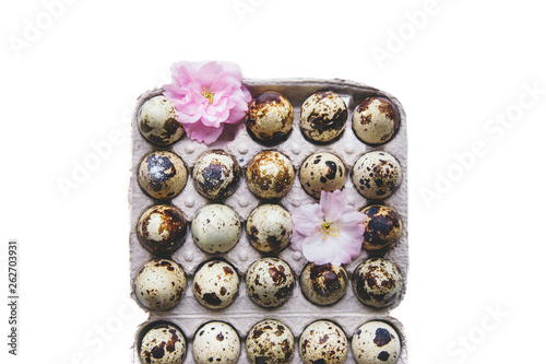 Eggs and blossom in box.