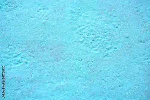 Blue grunge concrete texture background. Rough blue painted cement surface.