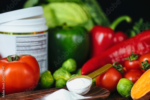 Collagen Protein Supplement Powder and Vegetables photo