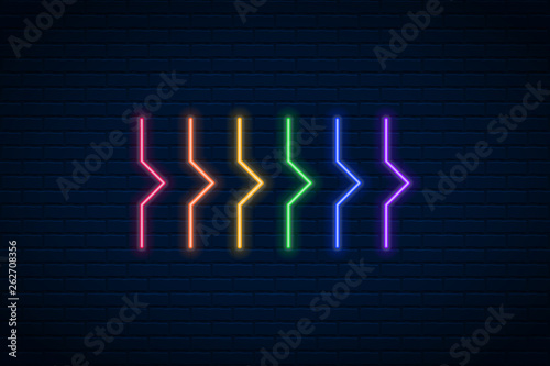 Canvas Print Vector glowing neon arrow  on dark brick wall background.