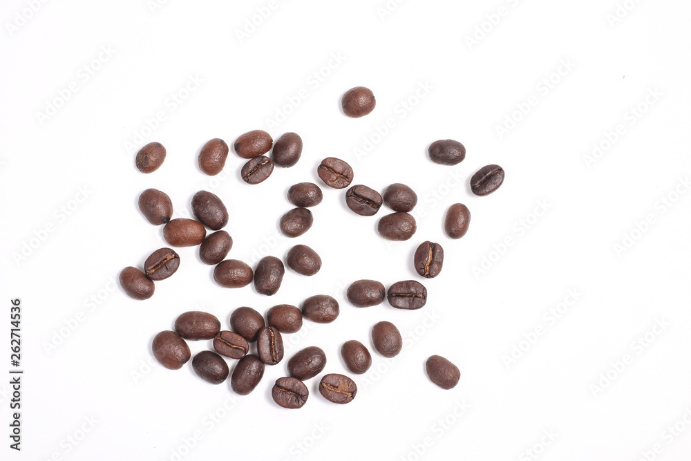 Top view of Roasted coffee beans, dark Roast coffee background. Closeup top view pile of coffee beans on white background, space for text Top view of Roasted coffee beans, dark Roast coffee background. Closeup top view pile of coffee beans on white background, space for text