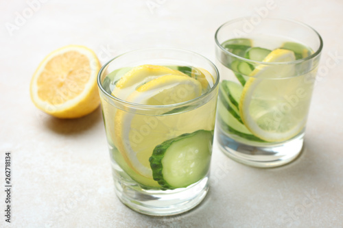 cup of water with lemon and cucumber
