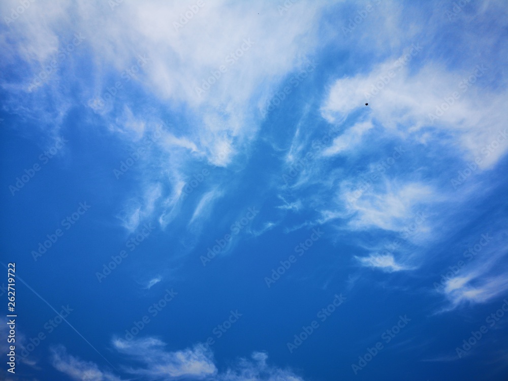 White clouds in the blue sky cloudy natural background White clouds in the blue sky cloudy natural background