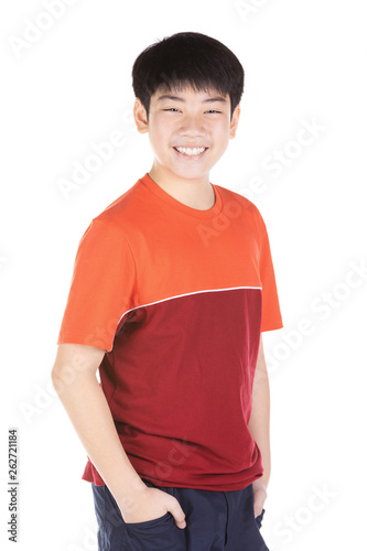 Portrait of asian smiling teen boy. Medium shot of handsome guy.
