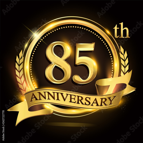 85th golden anniversary logo with ring and ribbon, laurel wreath vector design. photo