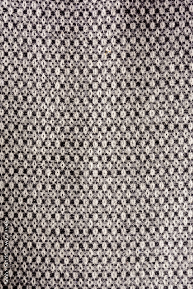 Woolen fabric with patterns, natural, beautiful texture and a gentle background. Woolen fabric with patterns, natural, beautiful texture and a gentle background.