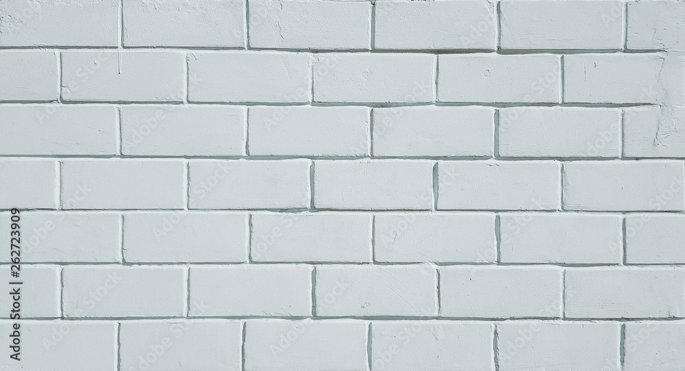Naklejka premium White stone brick textured wall for background.
