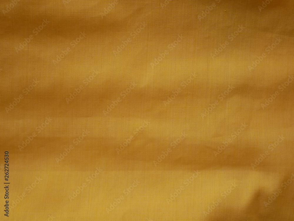 Fototapeta premium golden silk fabric background