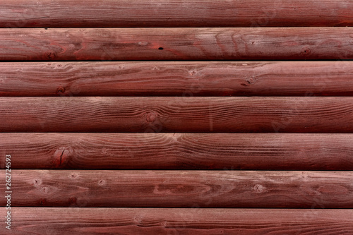 Modern walls are dark brown bars, dark texture.