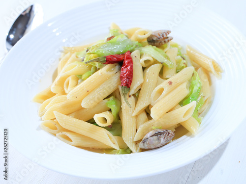 Penne pasta with anchovy and spring cabbage and shells アンチョビと春キャベツのペンネパスタ