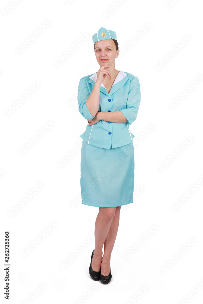 Charming and smiling stewardess wearing in the blue uniform. Isolated on white background Charming and smiling stewardess wearing in the blue uniform. Isolated on white background