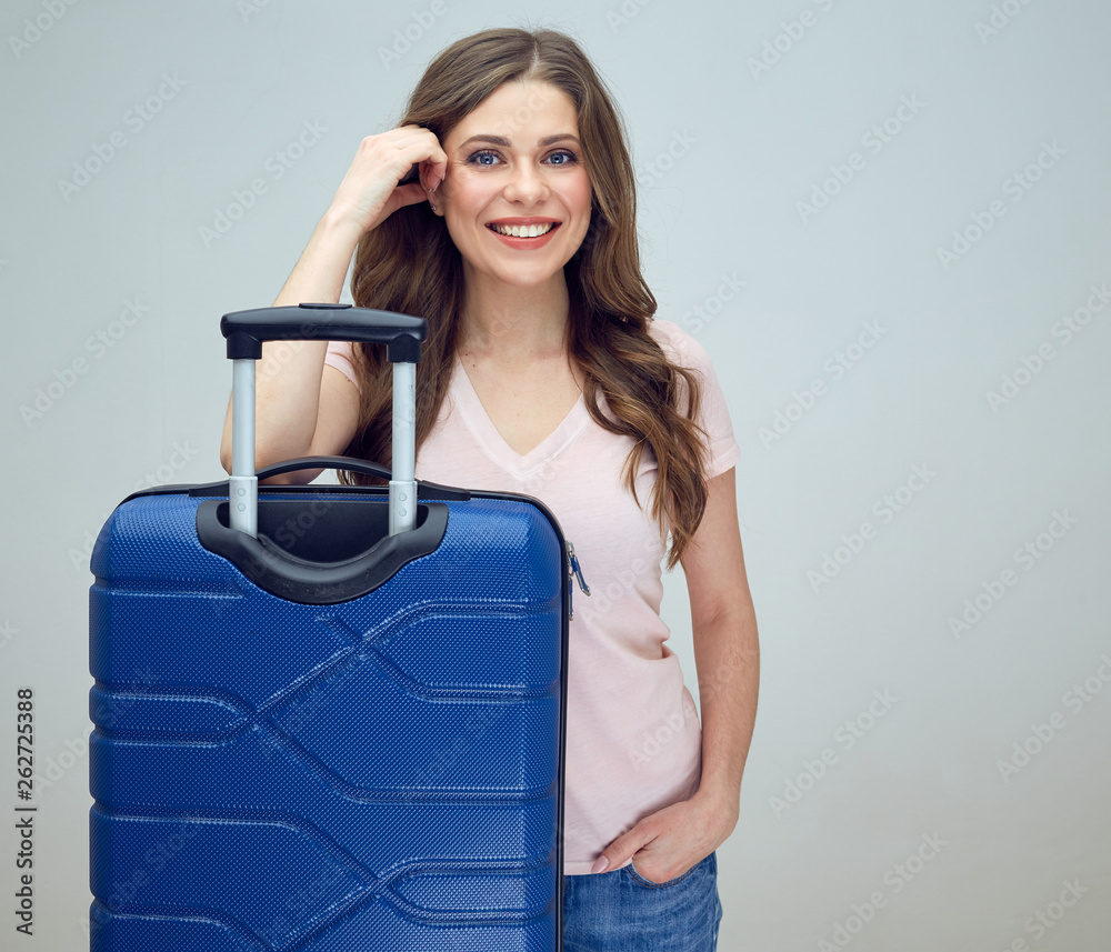 happy woman ready for travel with her suitcase. happy woman ready for travel with her suitcase.