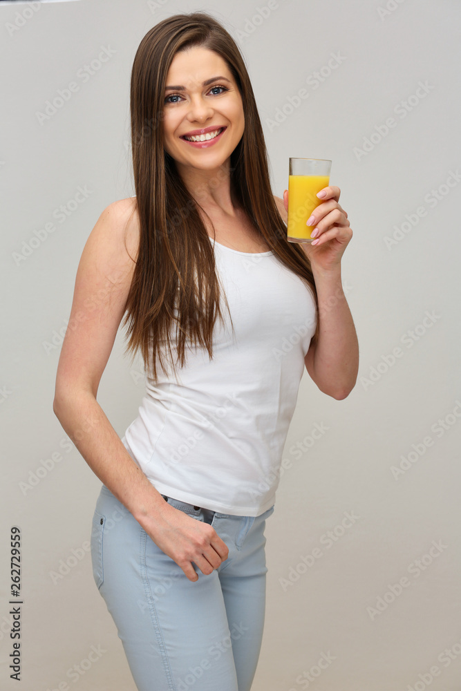 woman has vitamin with orange juice. woman has vitamin with orange juice.