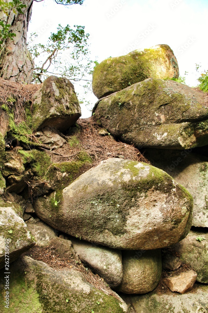 Stacked rocks in a Leafy garden in Sintra Stacked rocks in a Leafy garden in Sintra