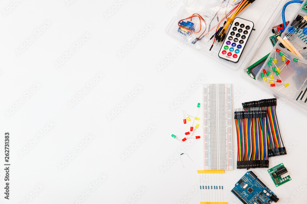 DIY arduino. Flat layout on white background, copy space. Electronic workshop components. 