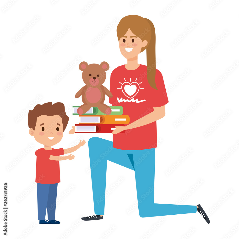 woman volunteer giving a boy books and bear teddy woman volunteer giving a boy books and bear teddy