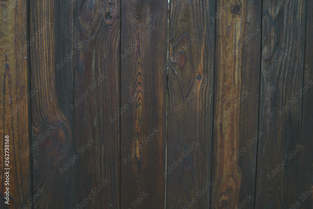 Background of flaky wood. Wooden panels with aged flaky surface