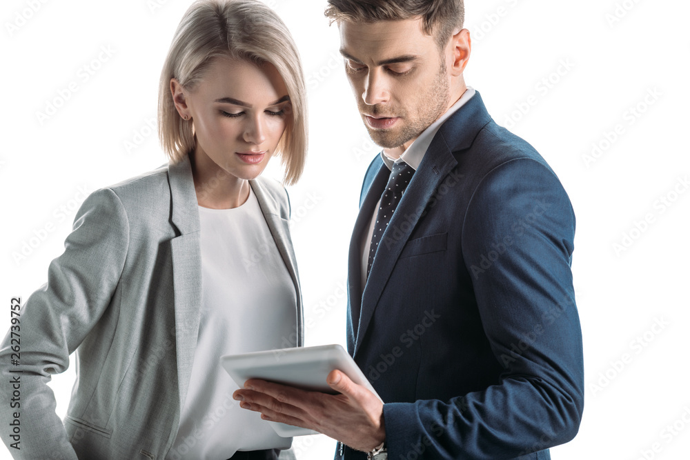 thoughtful business partners using digital tablet isolated on white thoughtful business partners using digital tablet isolated on white