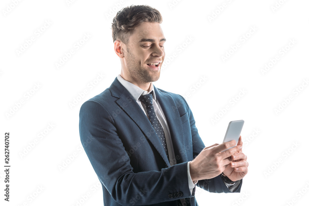 handsome, cheerful businessman using smartphone isolated on white handsome, cheerful businessman using smartphone isolated on white