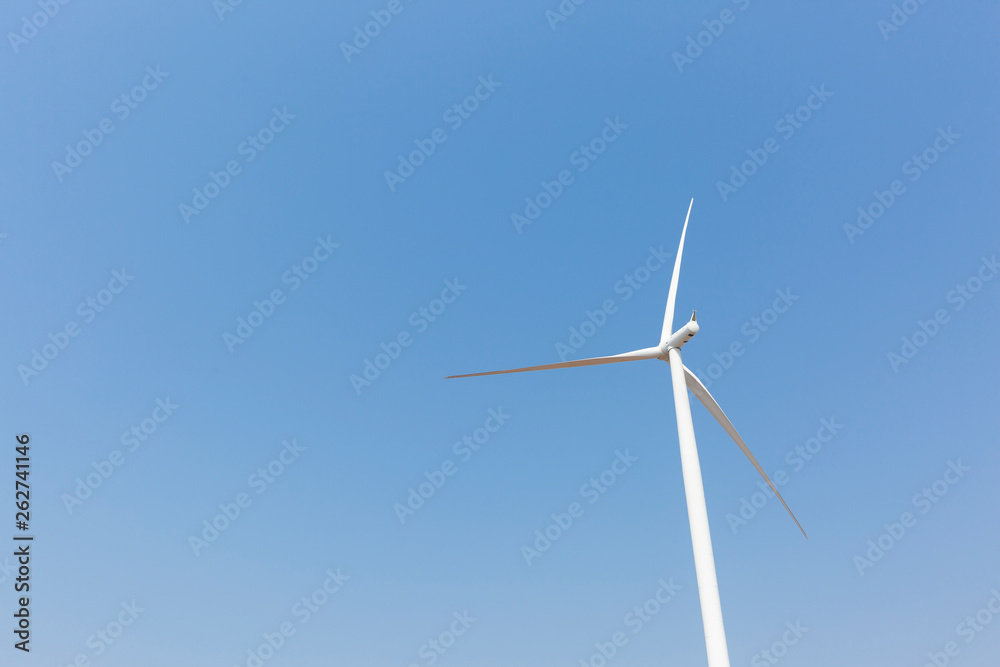 A Wind Turbine with blue sky. A Wind Turbine with blue sky.