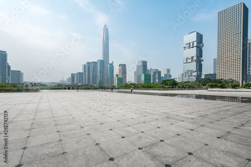 Panoramic skyline and buildings with empty concrete square floor in shenzhen,china © onlyyouqj