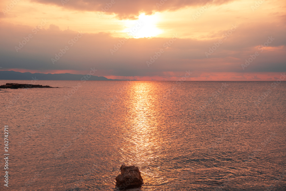 Beautiful sunset on the sea.Beautiful orange sky and water Beautiful sunset on the sea.Beautiful orange sky and water