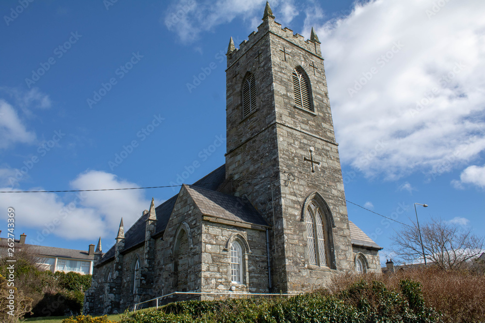 Church bell tower located near the West of Ireland. Ireland, known as the island of saints and scholars, is dotted with church buildings. 