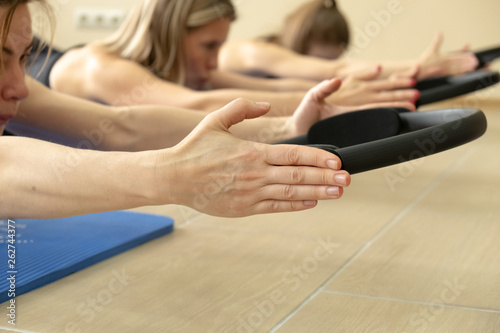 Pilates with the magic circle hand exercises