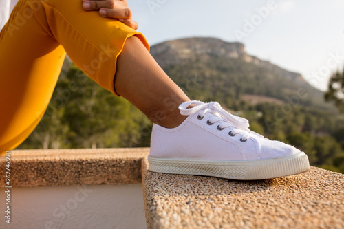 close-up of white sneakers