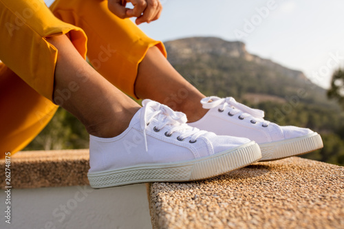 close-up of white sneakers photo