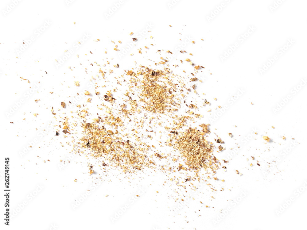 Ground, milled nutmeg powder isolated on white background, top view