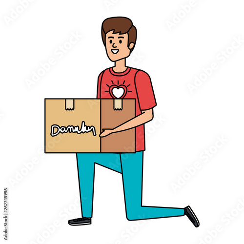 young man volunteer lifting donations box