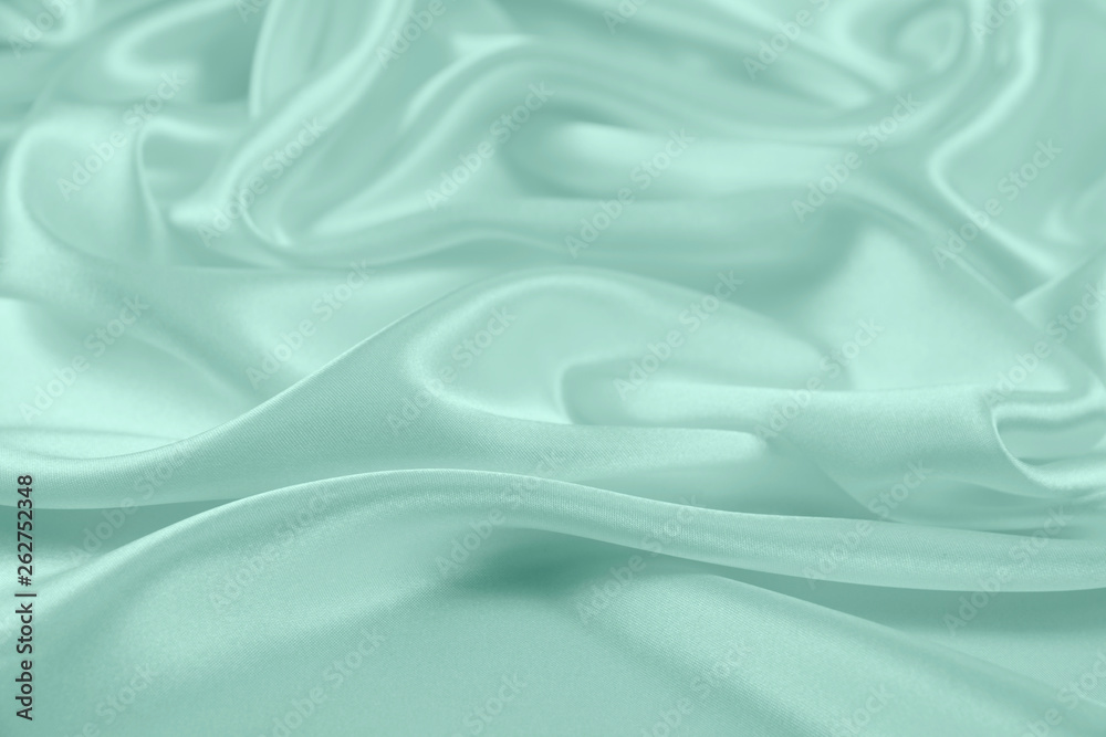 Obraz premium Green satin fabric texture for background