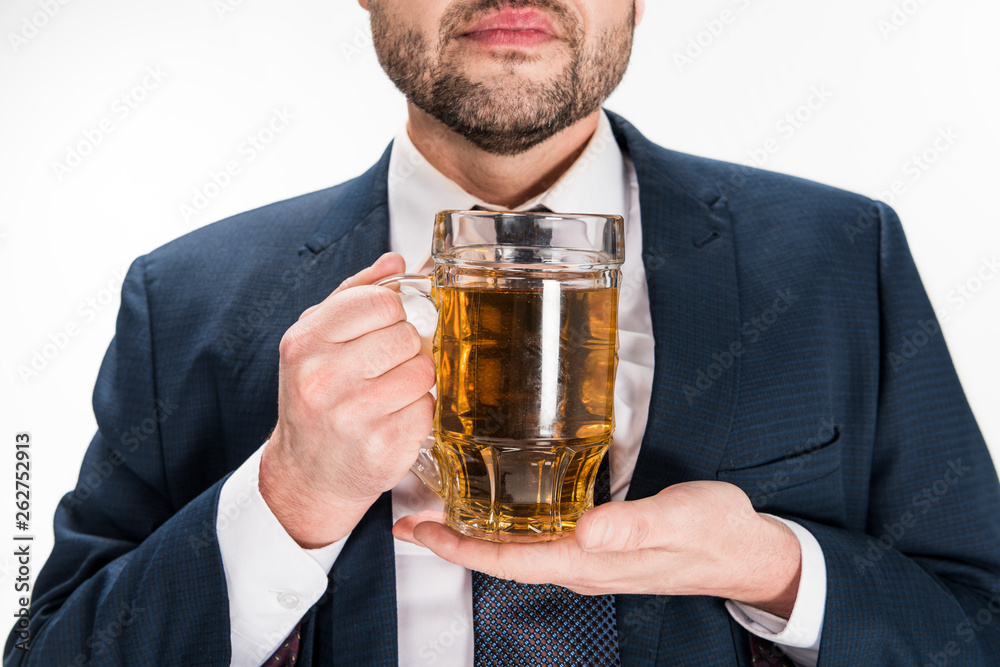 cropped view of chubby man in formal wear holding glass of beer on white cropped view of chubby man in formal wear holding glass of beer on white