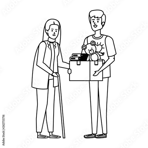 man volunteer giving a old woman donations box