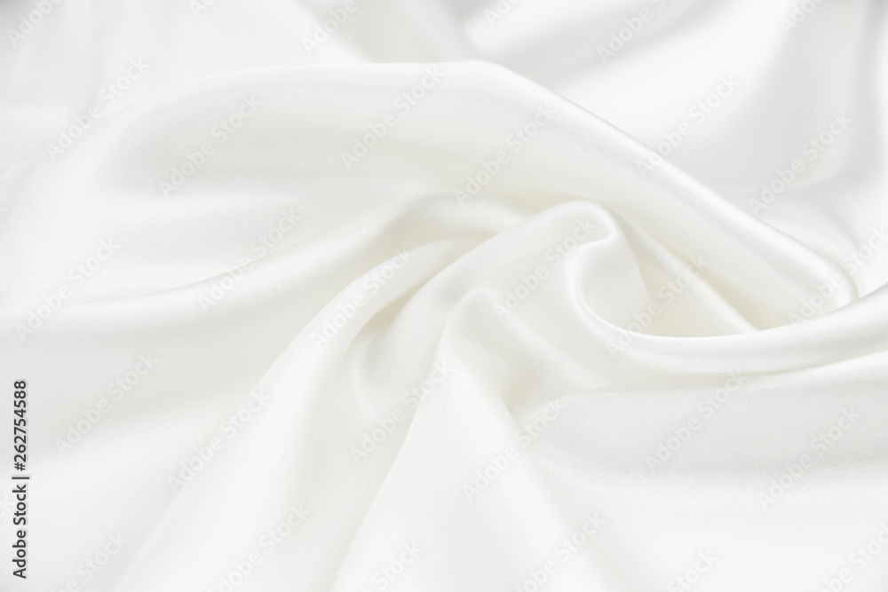 Obraz premium The texture of the satin fabric of white color for the background