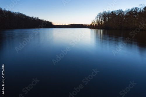 Calm forest lake early in the morning. The Sun slowly rising © nuclear_xonix
