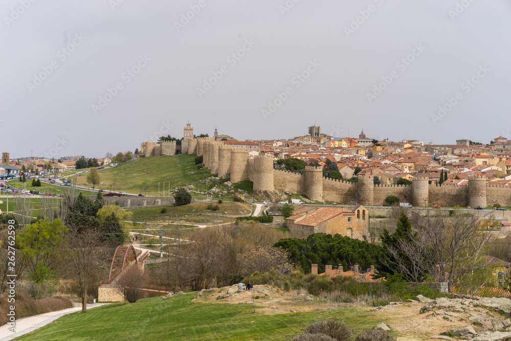 Tourism, View of the medieval wall of the city of Avila, in Spain. Spanish fortress