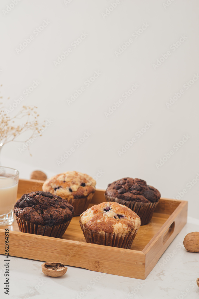 Fototapeta premium Breakfast with fresh homemade delicious muffins and milk.