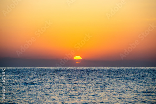 Early summer morning bright sky Beach in Crete