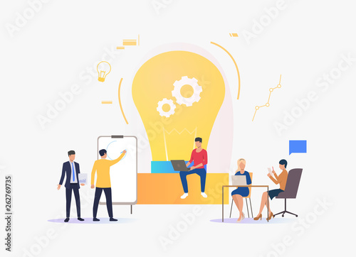 Light bulb, people discussing ideas and working