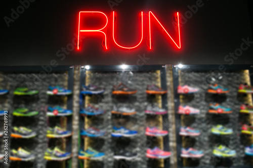 Trendy casual running shoes on dark background