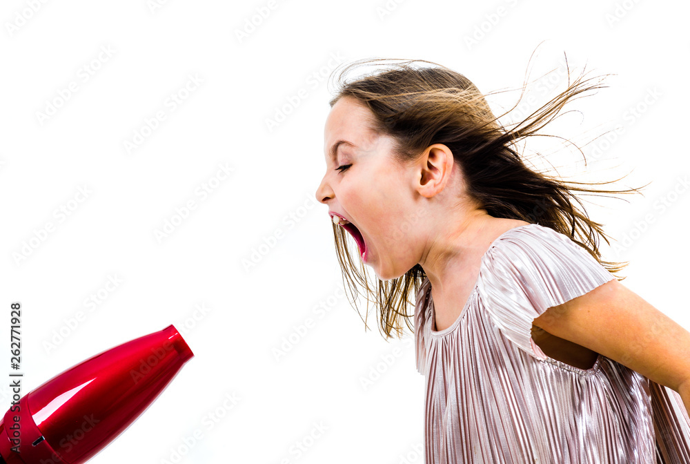 © _jure - Girl is yelling, shouting at blow dryer - hair dryer. © _jure - Girl is yelling, shouting at blow dryer - hair dryer.