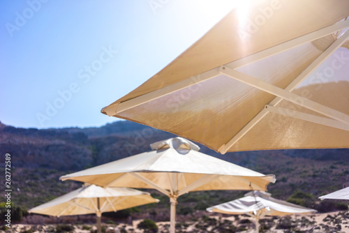 View at parasol and sunbeds at sea lagoon of Balos  Greece