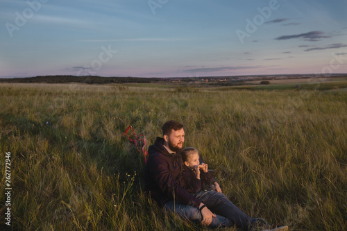 Father with a small daughter walk in summer nature. Fathers day concept. © irinanillu