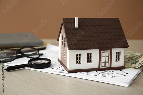 Figure of house, magnifier,...