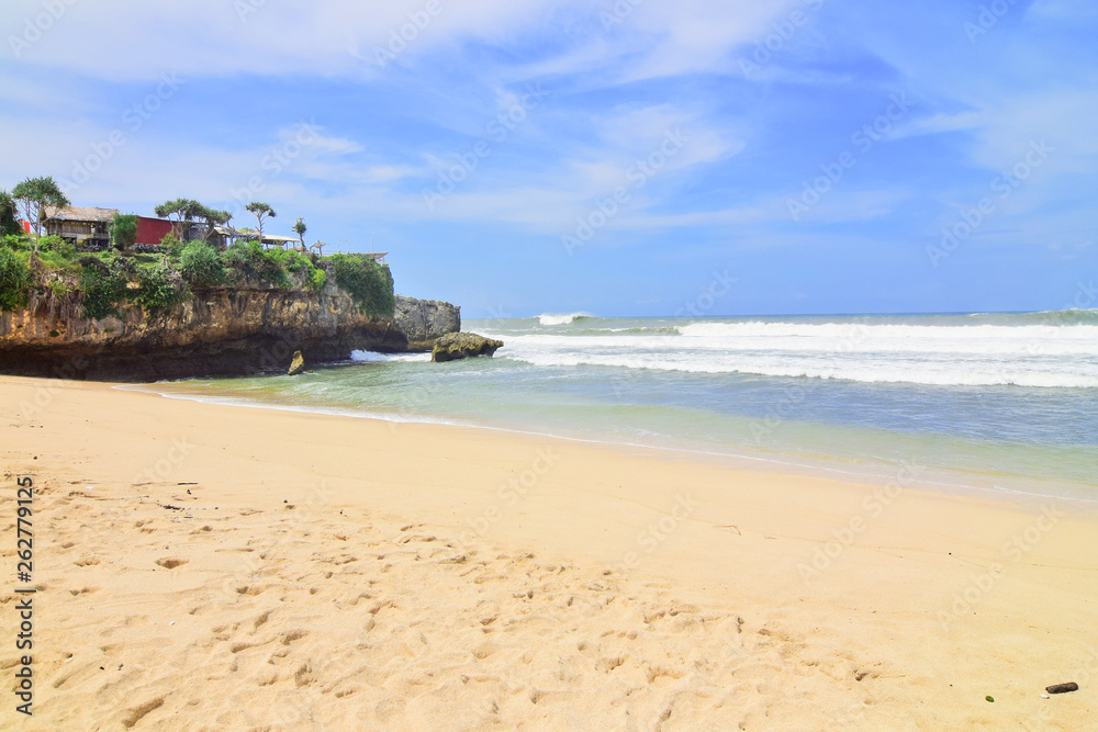 beach views - natural views of the south coast in the Yogyakarta region. This beach is white sand, high cliffs, and lots of rocks