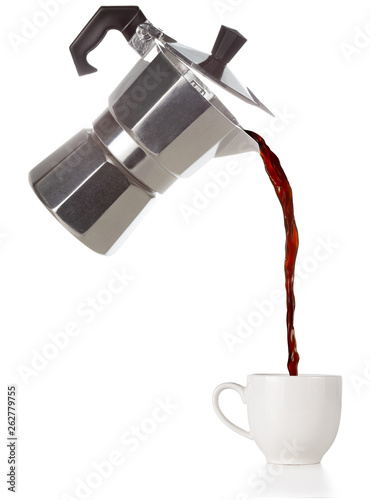 coffee poured from a flying moka into a cup isolated on white