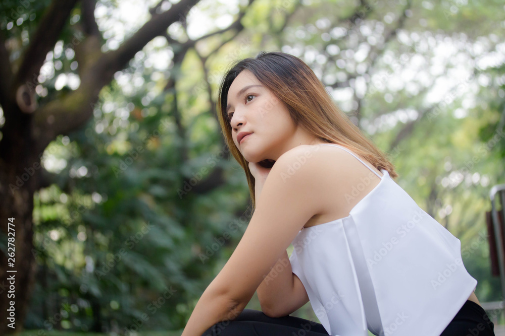 Portrait of thai adult beautiful girl relax and smile Portrait of thai adult beautiful girl relax and smile