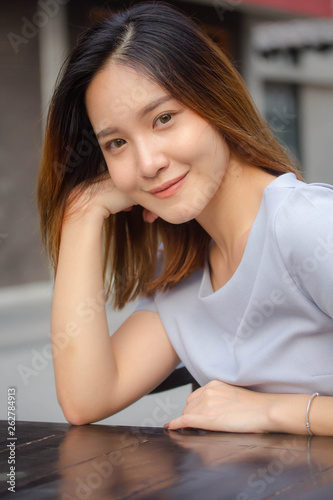 portrait of thai china adult office girl relax and smile